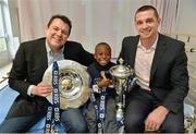 11 February 2013; The RBS 6 Nations and Triple Crown Trophies visited Our Lady's Hospital for Sick Children, Crumlin, Dublin, today, as part of the Ulster Bank and RBS 6 Nations Trophy Tour, which is travelling across the country this week. Pictured at Our Lady's Hospital for Sick Children, are former Ireland rugby internationals Reggie Corrigan, left, and Alan Quinlan with Samuel Ukanacho, age 6, from Ennis, Co. Clare. The trophy tour is being held as part of Ulster Bank’s sponsorship of community rugby in Ireland which includes the Ulster Bank League and Ulster Bank RugbyForce. Now in its third year, the RugbyForce initiative provides rugby clubs with the opportunity to win support packages to renovate their club and upgrade their facilities. This year, five clubs will receive a €5,000 prize, with one coming down to a public vote. Rugby clubs have until Friday April 12th to enter RugbyForce on Ulster Bank’s dedicated rugby website, www.ulsterbank.com/rugby. Ulster Bank and RBS 6 Nations Trophy Tour, Our Lady's Hospital for Sick Children, Crumlin, Dublin. Picture credit: Barry Cregg / SPORTSFILE