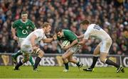 10 February 2013; Jonathan Sexton, Ireland, is tackled by Chris Robshaw, left, and Owen Farrell, England. RBS Six Nations Rugby Championship, Ireland v England, Aviva Stadium, Lansdowne Road, Dublin. Picture credit: Brendan Moran / SPORTSFILE