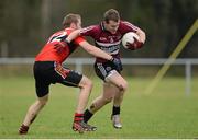 13 February 2013; Declan McCusker, St Mary's, Belfast, in action against JB Spillane, UCC. Irish Daily Mail Sigerson Cup Quarter-Final, UCC v St Mary's, Belfast, Ballykelly GAA club, Monasterevin, Co. Kildare. Picture credit: Matt Browne / SPORTSFILE