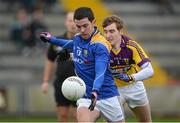 3 February 2013; Francis McGee, Longford, in action against Robbert Tierney, Wexford. Allianz Football League, Division 2, Wexford v Longford, Wexford Park, Wexford. Picture credit: Matt Browne / SPORTSFILE