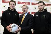 15 February 2013; An Taoiseach Enda Kenny T.D with Donegal footballer Michael Murphy, left, and Mayo footballer Kevin McLoughlin in attendance at an announcement between Elverys Sports and Coaching Ireland. Elverys Sports, Dundrum Town Centre, Dublin. Picture credit: David Maher / SPORTSFILE