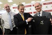 15 February 2013; An Taoiseach Enda Kenny T.D with Patrick Rowland, left, CEO of Elverys Sports, and Michael McGeehin, Coaching Ireland, in attendance at an announcement between Elverys Sports and Coaching Ireland. Elverys Sports, Dundrum Town Centre, Dublin. Picture credit: David Maher / SPORTSFILE