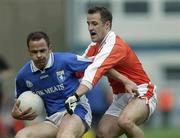 20 April 2003; Tom Kelly, Laois, in action against Armagh's Barry O'Hagan. Allianz National Football League, Division 1, Armagh v Laois, Croke Park, Dublin. Football. Picture credit; Pat Murphy / SPORTSFILE *EDI*