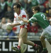 20 April 2003; Brian Dooher, Tyrone, in action against Fermanagh's Ryan McCloskey. Allianz National Football League, Division 1, Fermanagh v Tyrone, Croke Park, Dublin. Football. Picture credit; Ray McManus / SPORTSFILE *EDI*