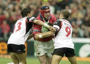 26 April 2003; Anthony Foley, Munster, in action against Xavier Garbajosa, left, and Frederic Michalak, Toulouse. Heineken European Cup Semi Final, Toulouse v Munster, Le Stadium de Toulouse, Toulouse, France. Rugby. Picture credit; Brendan Moran / SPORTSFILE *EDI*