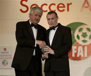 27 April 2003; William Flood, Manchester City, is presented with the Under 17 Player of the Year Award by FAI President Milo Corcoran at the eircom / Football Association of Ireland Awards at the Citywest Hotel, Dublin. Soccer. Picture credit; Brendan Moran / SPORTSFILE *EDI*