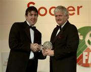 27 April 2003; Graham Dunning, Bluebell United Football Club is presented with the Intermediate Player of the Year Award by FAI President Milo Corcoran at the eircom / Football Association of Ireland Awards at the Citywest Hotel, Dublin. Soccer. Picture credit; Brendan Moran / SPORTSFILE *EDI*