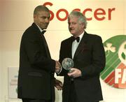 27 April 2003; Steven Reid is presented with the Young Player of the Year Award by FAI President Milo Corcoran at the eircom / Football Association of Ireland Awards at the Citywest Hotel, Dublin. Soccer. Picture credit; Brendan Moran / SPORTSFILE *EDI*