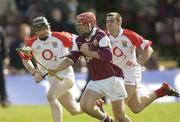 27 April 2003; Alan Kerins, Galway, in action against Cork's Mark Prendergast and Wayne Sherlock. Allianz National Hurling League, Division 1, Galway v Cork, Pearse Stadium, Galway. Picture credit; Damien Eagers / SPORTSFILE *EDI*