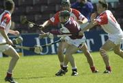 27 April 2003; Damien Joyce, Galway, in action against Cork's Setanta O'hAilpin and Alan Browne. Allianz National Hurling League, Division 1, Galway v Cork, Pearse Stadium, Galway. Picture credit; Damien Eagers / SPORTSFILE *EDI*