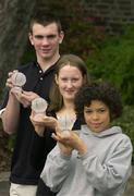 2 May 2003; Denis Crowley, left, winner of the Junior Schoolboy of the Year award, Eileen O'Connor, winner of the Junior Schoolgirl of the Year award and Eric Westbrooks, who accepted the Junior International Player of the Year Award on behalf of his brother Isaac, at the Irish Basketball Annual Awards at the Burlington Hotel, Dublin. Picture credit; Brendan Moran / SPORTSFILE *EDI*