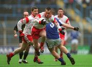 4 May 2003; Brian McGuigan, Tyrone, in action against Colm Byrne, Laois. Allianz National Football League Division 1 Final, Tyrone v Laois, Croke Park, Dublin. Football. Picture credit; Brendan Moran / SPORTSFILE