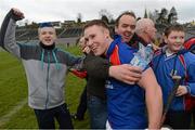 16 February 2013; Bernard Burke, St Thomas', celebrates with fans after the game. AIB GAA Hurling All-Ireland Senior Club Championship, Replay, St Thomas v Loughgiel Shamrocks, St. Tiernach's Park, Clones, Co. Monaghan. Picture credit: Oliver McVeigh / SPORTSFILE