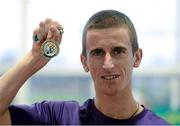 16 February 2013; Robert Heffernan, Togher A.C., with his gold medal after winning the men's walk final. Woodie’s DIY AAI Senior Indoor Championships, Athlone Institute of Technology International Arena, Athlone, Co. Westmeath. Picture credit: Stephen McCarthy / SPORTSFILE