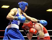 16 February 2013; Kenneth Egan, Neilstown, left, exchanges punches with Davey Joe Joyce, Crumlin, in their 81kg bout. National Elite Boxing Championships, Semi-Finals, National Stadium, Dublin. Picture credit: Pat Murphy / SPORTSFILE