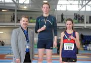 16 February 2013; Ciarán Ó Catháin, President of Athletics Ireland, with Laura Reynolds, Mohill A.C., winner of the women's walk event and second place Alicia Boylan, Oriel A.C.. Woodie’s DIY AAI Senior Indoor Championships, Athlone Institute of Technology International Arena, Athlone, Co. Westmeath. Picture credit: Stephen McCarthy / SPORTSFILE