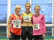 16 February 2013; Winner of the women's 3000m final Lizzie Lee, Leevale A.C., with second place Ann-Marie McGlynn, Lifford A.C., left, and third place Eimear O'Brien, Sligo A.C., right. Woodie’s DIY AAI Senior Indoor Championships, Athlone Institute of Technology International Arena, Athlone, Co. Westmeath. Picture credit: Stephen McCarthy / SPORTSFILE