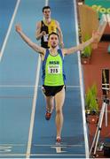 17 February 2013; John Coghlan, Metro St. Brigid's A.C., Dublin, celebrates as he crosses the line to win the Senior Mens 1500m event. Woodie’s DIY AAI Senior Indoor Championships, Athlone Institute of Technology International Arena, Athlone, Co. Westmeath. Picture credit: Tomas Greally / SPORTSFILE