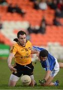 17 February 2013; Kevin Niblock, Ulster, in action against Aidan O'Mahony, Munster. M. Donnelly GAA Football Interprovincial Championship, Semi-Final, Ulster v Munster, Athletic Grounds, Armagh. Picture credit: Oliver McVeigh / SPORTSFILE