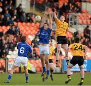 17 February 2013; Gary Brennan, Munster, and David Givney, Ulster, contest a dropping ball. M. Donnelly GAA Football Interprovincial Championship, Semi-Final, Ulster v Munster, Athletic Grounds, Armagh. Picture credit: Oliver McVeigh / SPORTSFILE