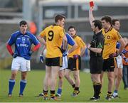 17 February 2013; David Givney, Ulster, is shown the red card by referee Jerome Henry. M. Donnelly GAA Football Interprovincial Championship, Semi-Final, Ulster v Munster, Athletic Grounds, Armagh. Picture credit: Oliver McVeigh / SPORTSFILE