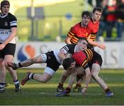 18 February 2013; Mark Sutton, Newbridge College, is tackled by Brett Keaveney, CBC Monkstown. Powerade Leinster Schools Senior Cup, Quarter-Final, Newbridge College v CBC Monkstown, Donnybrook Stadium, Donnybrook, Dublin. Picture credit: David Maher / SPORTSFILE