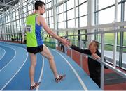 17 February 2013; John Coghlan, Metro St. Brigid's A.C., is congratulated by his father, former world 5,000m gold medallist, Eamonn Coghlan, following his victory in the men's 1500m event. Woodie’s DIY AAI Senior Indoor Championships, Athlone Institute of Technology International Arena, Athlone, Co. Westmeath. Picture credit: Stephen McCarthy / SPORTSFILE