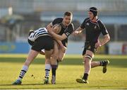 19 February 2013; Harrison Brewer, Terenure College, with support from team-mate Niall O'Sullivan, is tackled by Cormac Brennan, Cistercian College Roscrea. Powerade Leinster Schools Senior Cup Quarter-Final, Cistercian College Roscrea v Terenure College, Tallaght Stadium, Tallaght, Dublin. Picture credit: Barry Cregg / SPORTSFILE