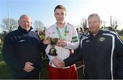 19 February 2013; IT Carlow ‘D’ captain Adam Phelan is presented with the cup by Tony O'Sullivan, Umbro, left,  and Padraig Carney, FAI. UMBRO CUFL Division Three Final, Moate Business College v IT Carlow ‘D’, Leixlip United, Leixlip, Co. Kildare. Picture credit: David Maher / SPORTSFILE