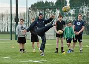 21 February 2013; Leinster Rugby began their new programme to find new talent in traditionally non-rugby playing areas around Dublin city, with Dublin City Council's first ever training session to create the first ever Dublin City Council rugby team. Leinster Development Coach John English demonstrates kicking skills during the training session. Dublin City Council Rugby Training, Dublin City Council Clontarf Road Sports Pitches, Clontarf, Dublin. Picture credit: Barry Cregg / SPORTSFILE