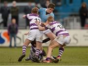 22 February 2013; Mikey O'Hare, St. Michael's College, is tackled by Will Lapin, left, Alan Jeffers, and Sebastian Fromm, right, Clongowes Wood College SJ. Powerade Leinster Schools Senior Cup Quarter-Final, Clongowes Wood College SJ v St. Michael's College, Donnybrook Stadium, Donnybrook, Dublin. Photo by Sportsfile