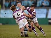 22 February 2013; Charlie Cregan, St. Michael's College, is tackled by Robbie Collins, left, and Fergal Cleary, Clongowes Wood College SJ. Powerade Leinster Schools Senior Cup Quarter-Final, Clongowes Wood College SJ v St. Michael's College, Donnybrook Stadium, Donnybrook, Dublin. Photo by Sportsfile