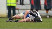 23 February 2013; Brian O'Hara, Cork Constitution, holds his left leg after picking up an injury before being stretchered off the pitch. Ulster Bank League, Division 1A, Cork Constitution v Lansdowne, Temple Hill, Cork. Picture credit: Diarmuid Greene / SPORTSFILE