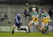 23 February 2013; Conor McCormack, Dublin, in action against Kevin Brady, left, Dermot Mooney, and Thomas Carroll, right, Offaly. Allianz Hurling League, Division 1B, Dublin v Offaly, Parnell Park, Dublin. Picture credit: Dáire Brennan / SPORTSFILE