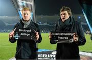 23 February 2013; Leinster players Tom Denton, left, and Quinn Roux hold up the names of Blackrock College and Cistercian College, Roscrea, who will meet in the Powerade Schools Senior Cup semi-final during the semi-final draw at half-time. Powerade Schools Senior Cup Semi-Final Draw, RDS, Ballsbridge, Dublin. Picture credit: Brendan Moran / SPORTSFILE