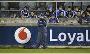 23 February 2013; Dublin manager Anthony Daly watches the last few moments from the pitch, while team doctor Dr. Chris Thompson and county board chairman Andy Kettle are forced to watch from behind the wall. Allianz Hurling League, Division 1B, Dublin v Offaly, Parnell Park, Dublin. Picture credit: Dáire Brennan / SPORTSFILE
