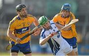 24 February 2013; Brian O'Sullivan, Waterford, in action against Domhnall O'Donovan, left, and Patrick O'Connor, Clare. Allianz Hurling League, Division 1A, Clare v Waterford, Cusack Park, Ennis, Co. Clare. Picture credit: Diarmuid Greene / SPORTSFILE