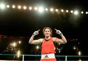 24 February 2013; Katie Taylor, Ireland, celebrates at the end of her international bout against Maike Klüners, Germany. Katie Taylor Fight Night, Bord Gais Energy Theatre, Grand Canal Square, Docklands, Dublin. Picture credit: David Maher / SPORTSFILE