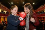 25 February 2013; Katie Taylor with Abbiegayle Ronayne, age 11, from Irishtown National School, Co. Mayo, after a press conference in the Royal Theatre, Castlebar, where it was announced she will fight Bulgaria's Denista Eliseeva on the 24th of March. Katie Taylor Press Conference, Royal Theatre, Castlebar, Co. Mayo. Picture credit: David Maher / SPORTSFILE
