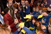 25 February 2013; Katie Taylor signs autographs for pupils of Scoil Raifteri, Castlebar, Co. Mayo, at a press conference at the Royal Theatre, Castlebar, where it was announced she will fight Bulgaria's Denista Eliseeva on the 24th of March. Katie Taylor Press Conference, Royal Theatre, Castlebar, Co. Mayo. Picture credit: David Maher / SPORTSFILE