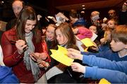 25 February 2013; Katie Taylor signs autographs for pupils of Scoil Raifteri, Castlebar, Co. Mayo, at a press conference at the Royal Theatre, Castlebar, where it was announced she will fight Bulgaria's Denista Eliseeva on the 24th of March. Katie Taylor Press Conference, Royal Theatre, Castlebar, Co. Mayo. Picture credit: David Maher / SPORTSFILE