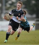 27 February 2013; Johnny Deane, Newbridge College, goes past the tackle of Daniel Hodgins, St. Gerard’s School. Powerade Leinster Schools Junior Cup, Quarter-Final, Newbridge College v St. Gerard’s School, Templeville Road, Dublin. Picture credit: Matt Browne / SPORTSFILE