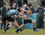 27 February 2013; Dylan Walker, Newbridge College, is tackled by Conor O'Farrell, St. Gerard’s School. Powerade Leinster Schools Junior Cup, Quarter-Final, Newbridge College v St. Gerard’s School, Templeville Road, Dublin. Picture credit: Matt Browne / SPORTSFILE