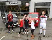 28 February 2013; Karmann Volkswagen has announced a new sponsorship deal with Bohemian Football Club, strengthening Volkswagen Group’s support for Irish soccer. The new dealership opened its doors in April 2012 and continues to build strong links with the local communities in Castleknock, Blanchardstown and further afield. At the announcement are Bohemian players Roberto Lopez, left, and Ryan McEvoy with young Bohemian supporters Olivia Rutherford, age 8, Jack Cahill, age 9, and Sophia Rutherford, age 6. Karmann Sales, Castleknock, Co. Dublin. Picture credit: Matt Browne / SPORTSFILE