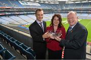 28 February 2013; The 2012 TESCO HomeGrown Club Person of the Year Awards took place today at Croke Park. The awards recognise the dedication and enthusiasm of our volunteers to their clubs throughout the country. Pictured receiving her award is Catherine Ring, from Knocknagree Ladies GFC, Co. Cork, with Patrick O'Connor, Local Marketing Manager Tesco, left, and Pat Quill, President of the Ladies Football Association. Croke Park, Dublin. Picture credit: Barry Cregg / SPORTSFILE