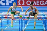 1 March 2013; Ireland's Derval O'Rourke races alongside Nevin Yanit, Turkey, during their heat of the Women's 60m Hurdles, where she finished in a season best time of 8.05sec and qualified for the semi-final. 2013 European Indoor Athletics Championships, Scandinavium Arena, Gothenburg, Sweden. Picture credit: Brendan Moran / SPORTSFILE