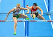 1 March 2013; Ireland's Derval O'Rourke, alongside Nadine Hildebrand, Germany, on her way to finishing 4th in the semi-final of the Women's 60m Hurdles, qualifying for the final in a time of 8.00sec. 2013 European Indoor Athletics Championships, Scandinavium Arena, Gothenburg, Sweden. Picture credit: Brendan Moran / SPORTSFILE