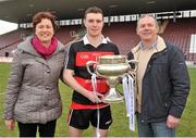 2 March 2013; University College Cork captain Darren McCarthy with his mother Anne and father John and the Fitzgibbon Cup. Irish Daily Mail Fitzgibbon Cup Final, Mary Immaculate College, Limerick v University College Cork, Pearse Stadium, Galway. Picture credit: Barry Cregg / SPORTSFILE