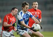 2 March 2013; Michael John Tierney, Laois, in action against Gerard Hoey, left, and Paddy Keenan, Louth. Allianz Football League, Division 2, Laois v Louth, O'Moore Park, Portlaoise, Co. Laois. Picture credit: Matt Browne / SPORTSFILE