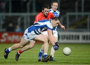 2 March 2013; John O'Loughlin, Laois, in action against Derek Crilly, Louth. Allianz Football League, Division 2, Laois v Louth, O'Moore Park, Portlaoise, Co. Laois. Picture credit: Matt Browne / SPORTSFILE